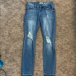 Distressed skinny jeans